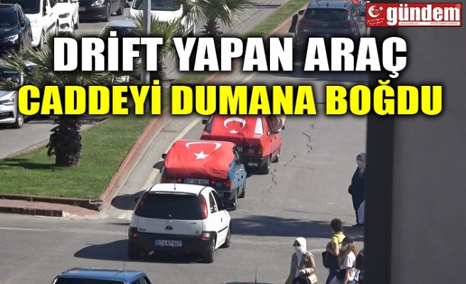 DRİFT YAPAN ARAÇ CADDEYİ DUMANA BOĞDU